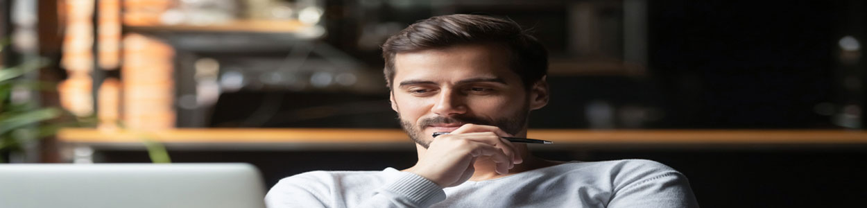 Man looking at a laptop screen